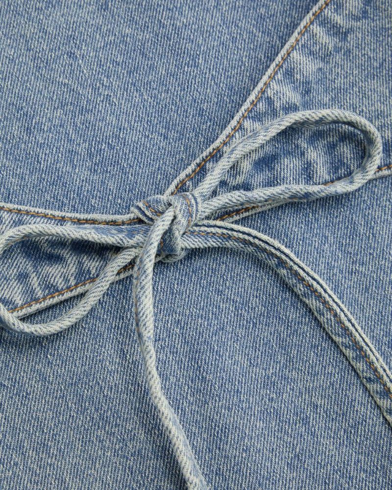 DENIM LOW RISE JEANS WITH BOWS