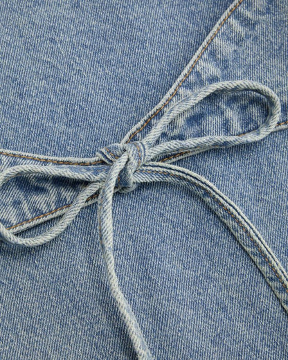 DENIM LOW RISE JEANS WITH BOWS